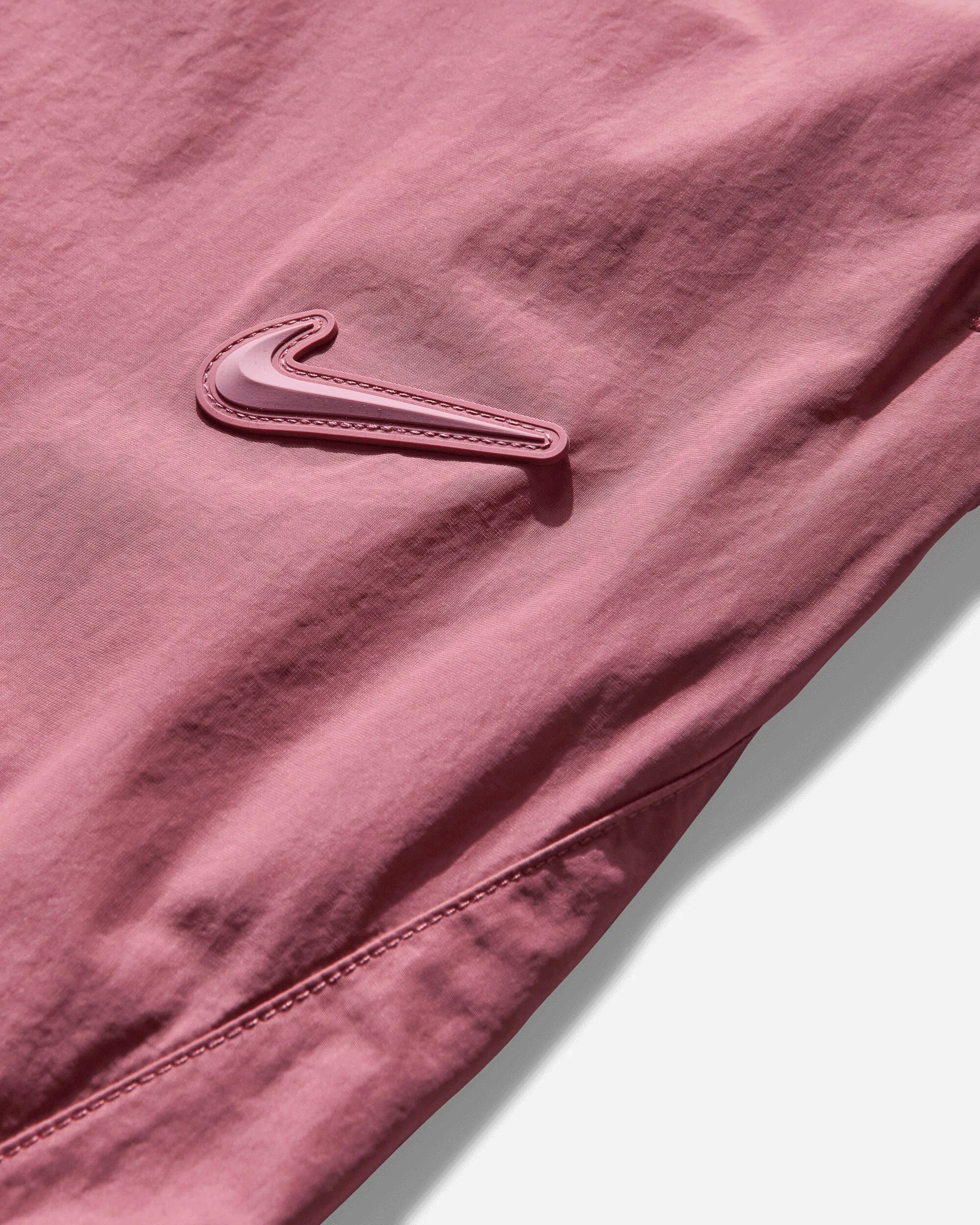 Men's NOCTA Woven Track Pants Desert Berry