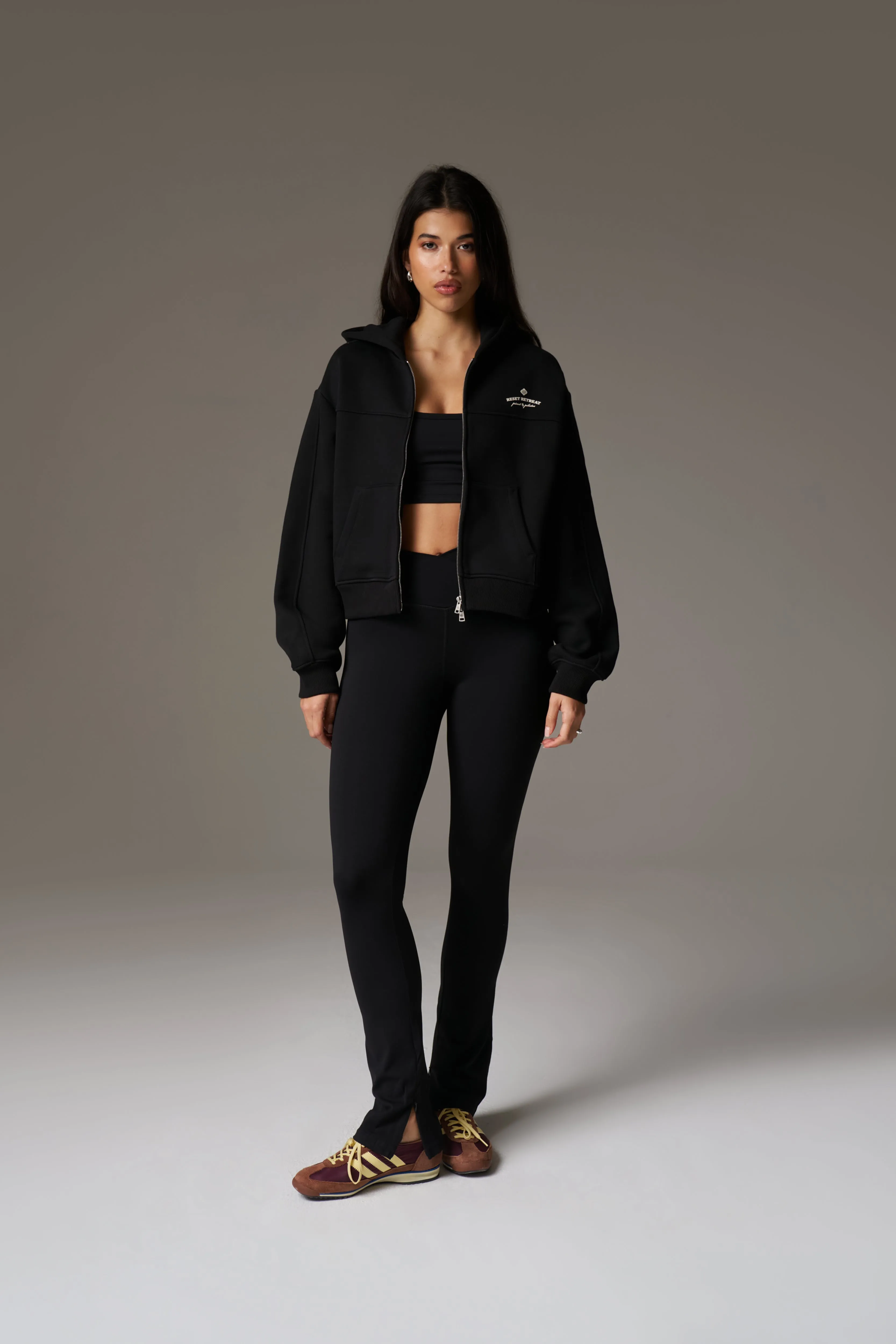 SCULPTING STRETCH ZIP HEM LEGGINGS - BLACK